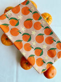 Tangerines on pink. block printed zipper pouch.